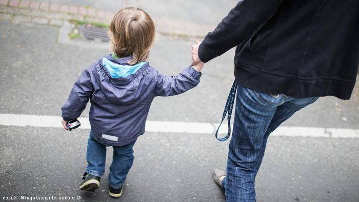 Holding Child's hand